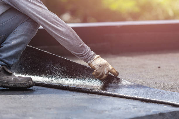 Professional Basement Waterproofing technician working in Wellington, AL